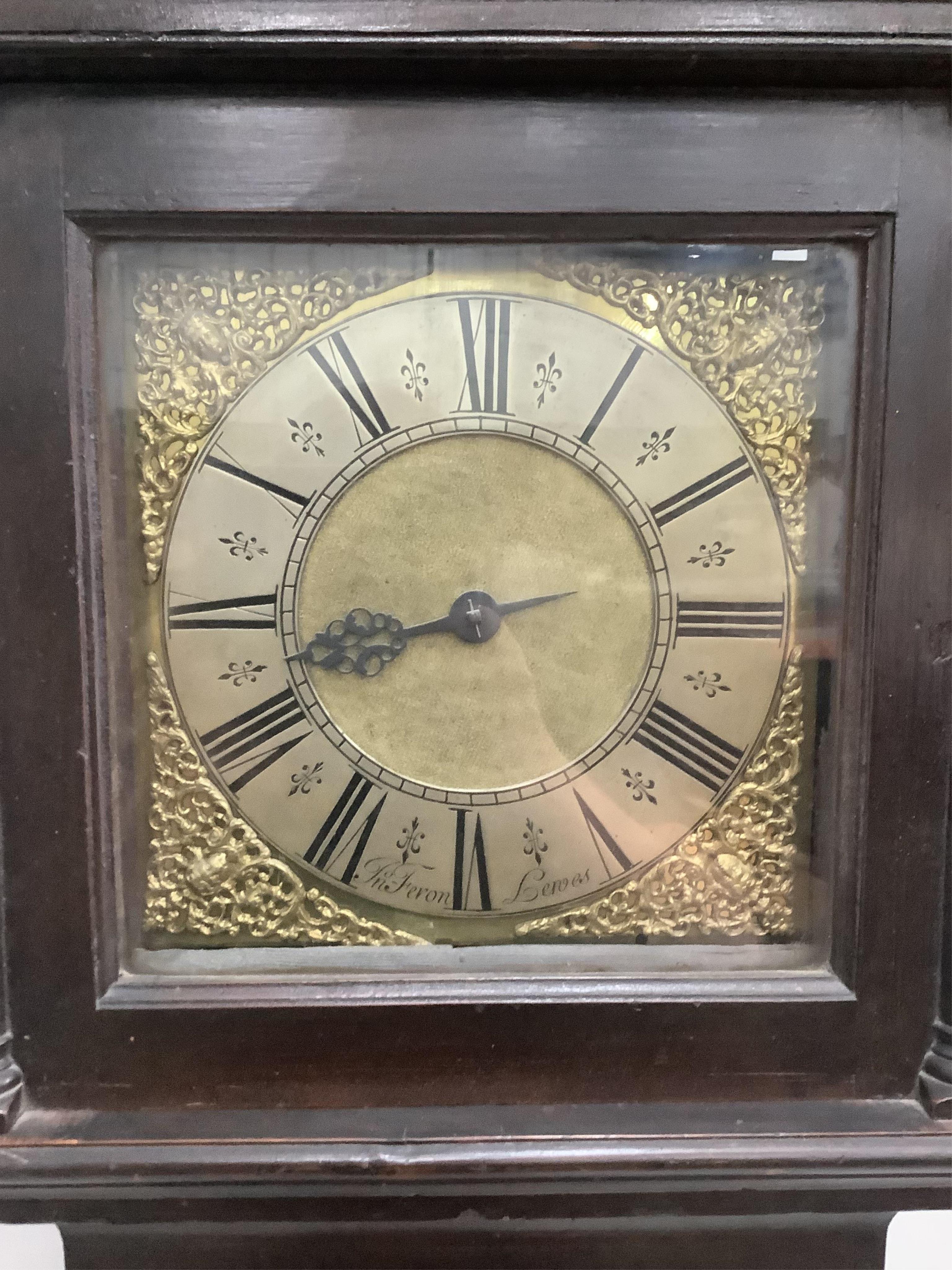 A mid 18th century thirty hour stained pine longcase clock by Jonathan Feron, Lewes, height 195cm. Condition - fair